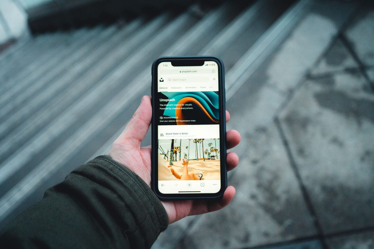 Person scrolling through saved posts on a smartphone screen
