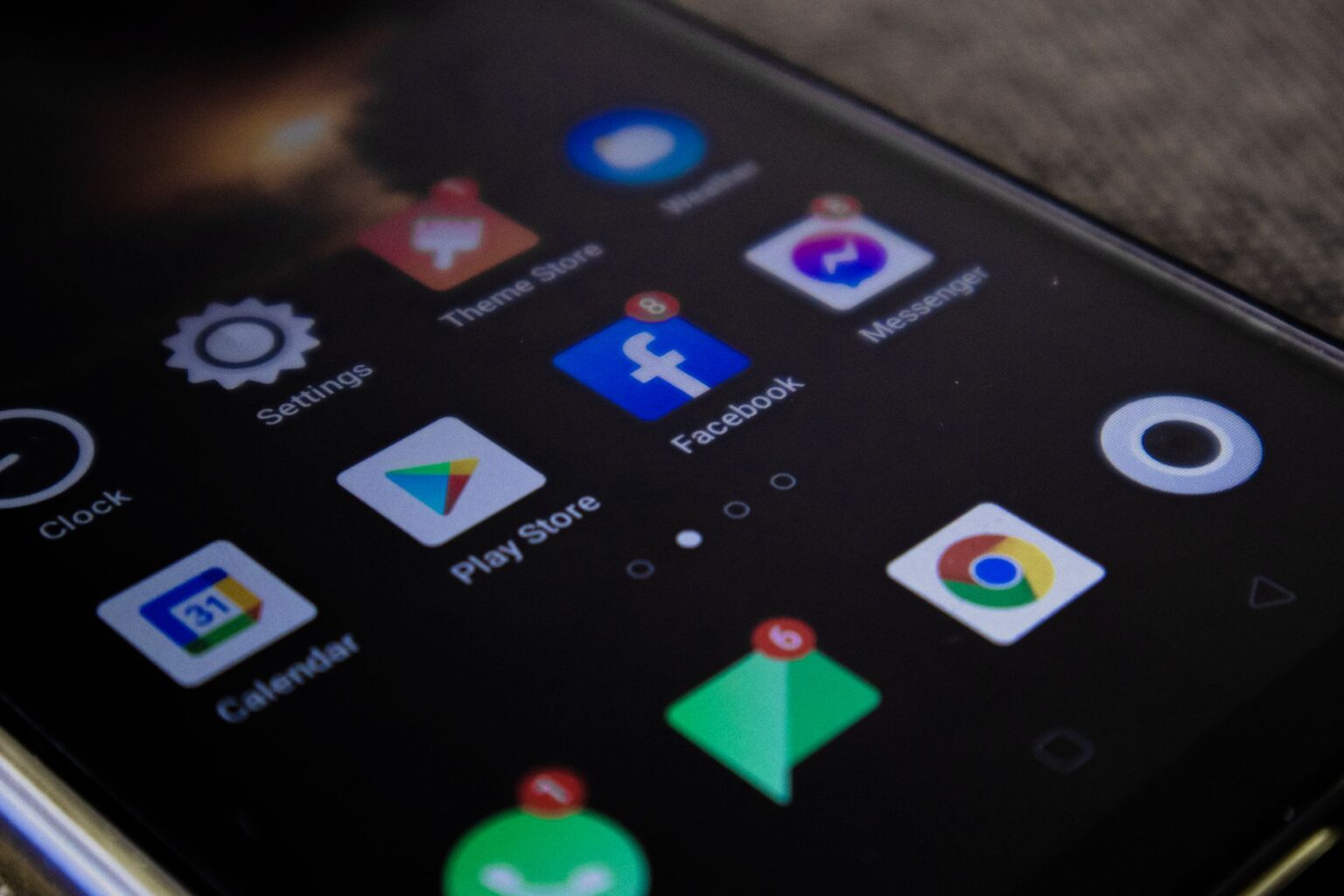 Person scrolling through a social networking app on a smartphone