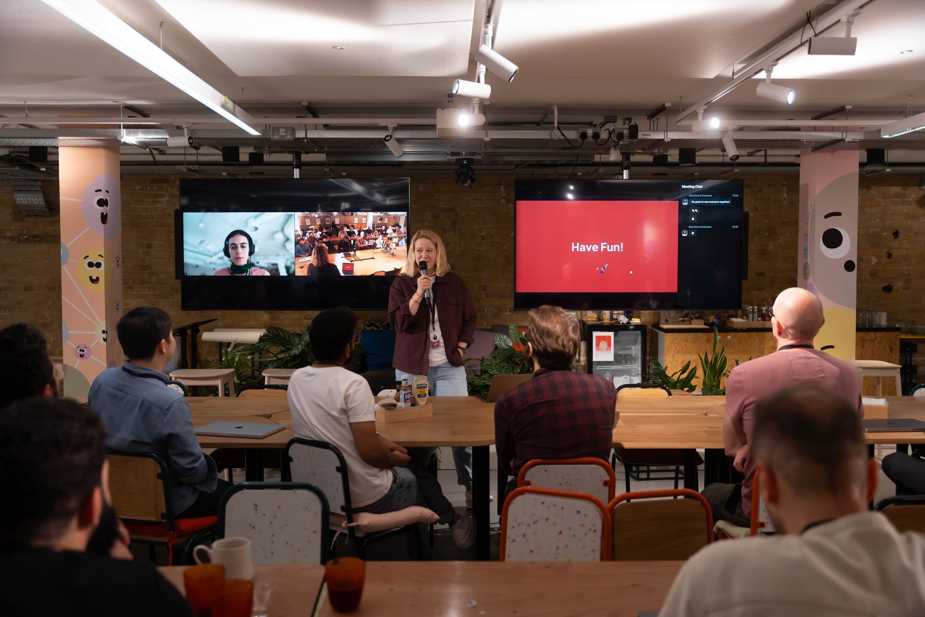 Professionals networking at a startup event with name badges
