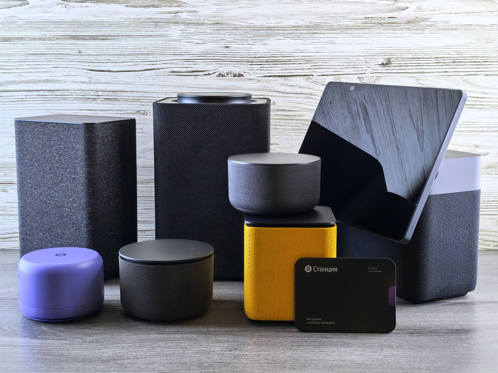 Close-up of a wireless speaker with visible control buttons and charging port