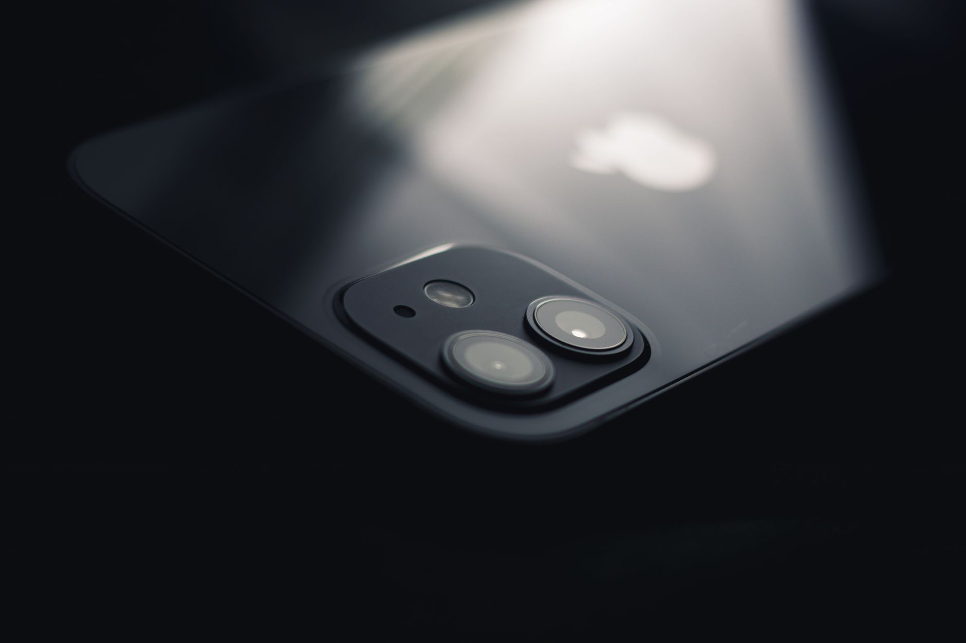Close-up of a smartphone camera lens being used for photography
