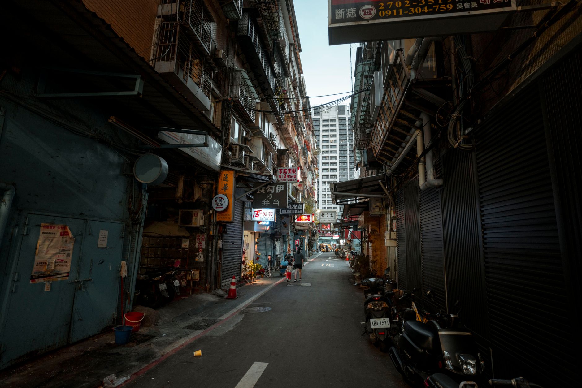 Person walking through an urban neighborhood discovering local spots