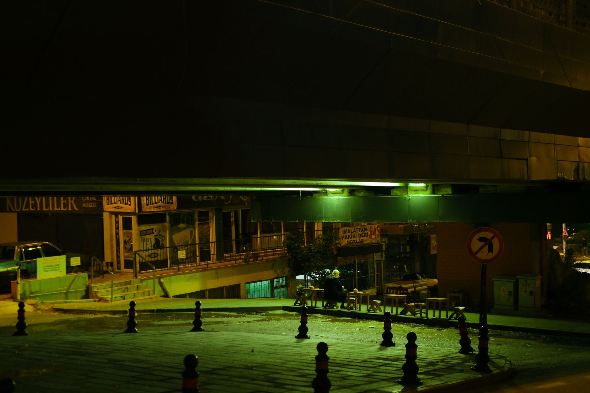 A neon-lit urban street at night, evoking the open-world setting of GTA 6