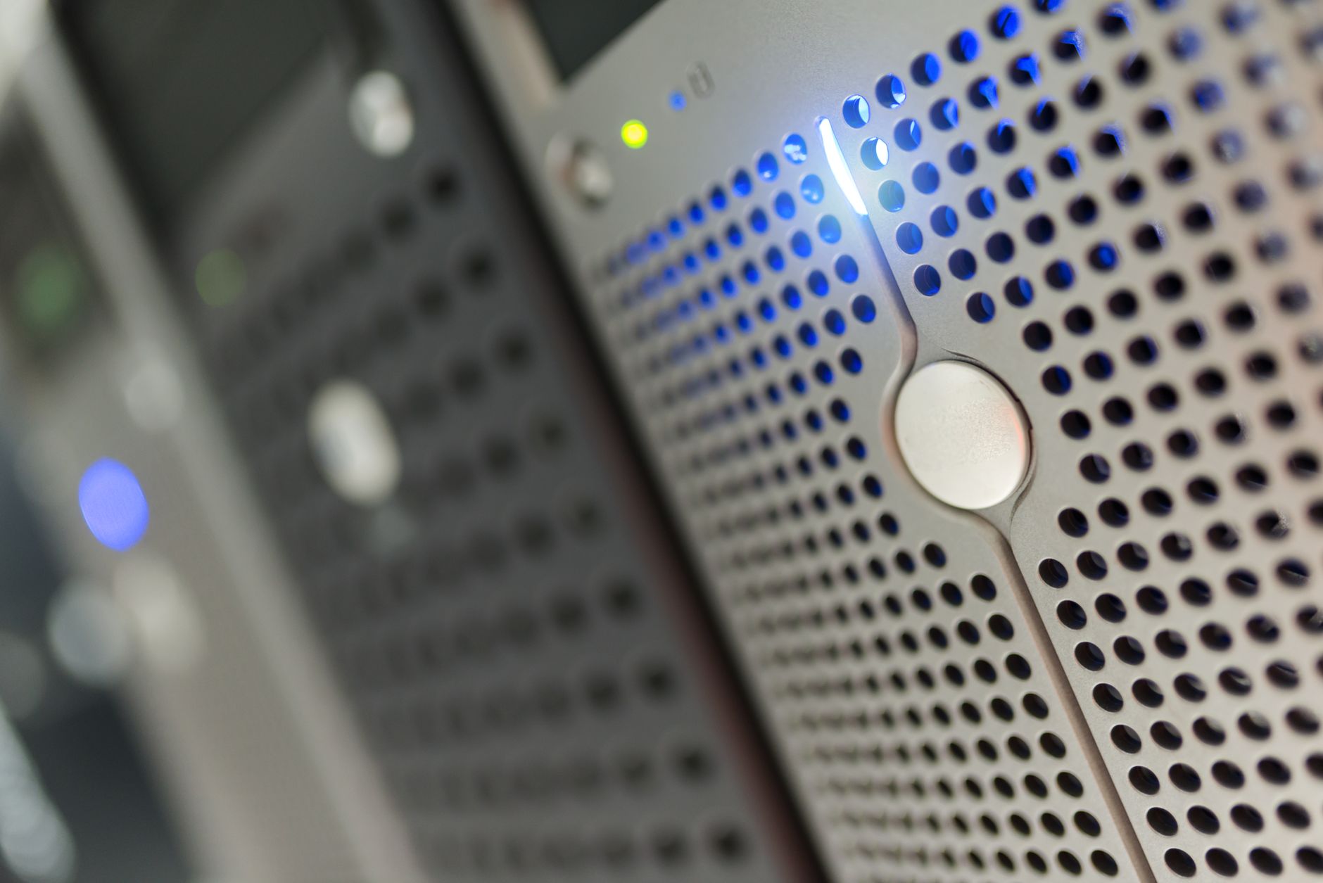 Rows of servers inside a modern data center facility