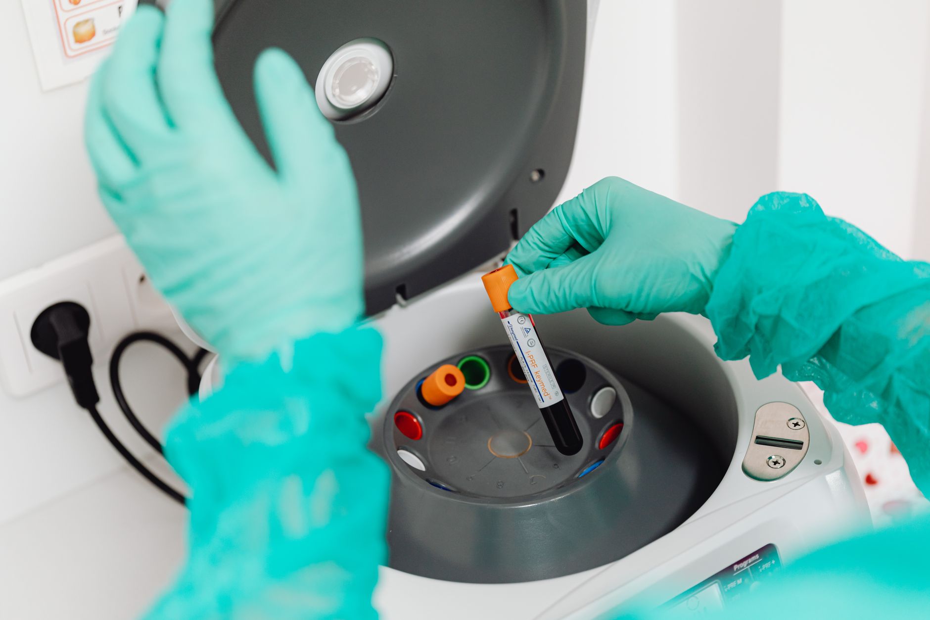 scientist working in a pharmaceutical research lab representing experimental drug development