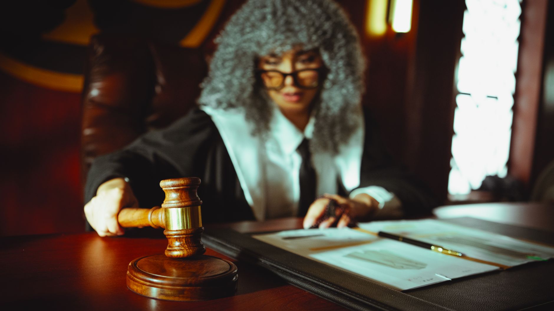 Empty courtroom representing tech company legal penalties