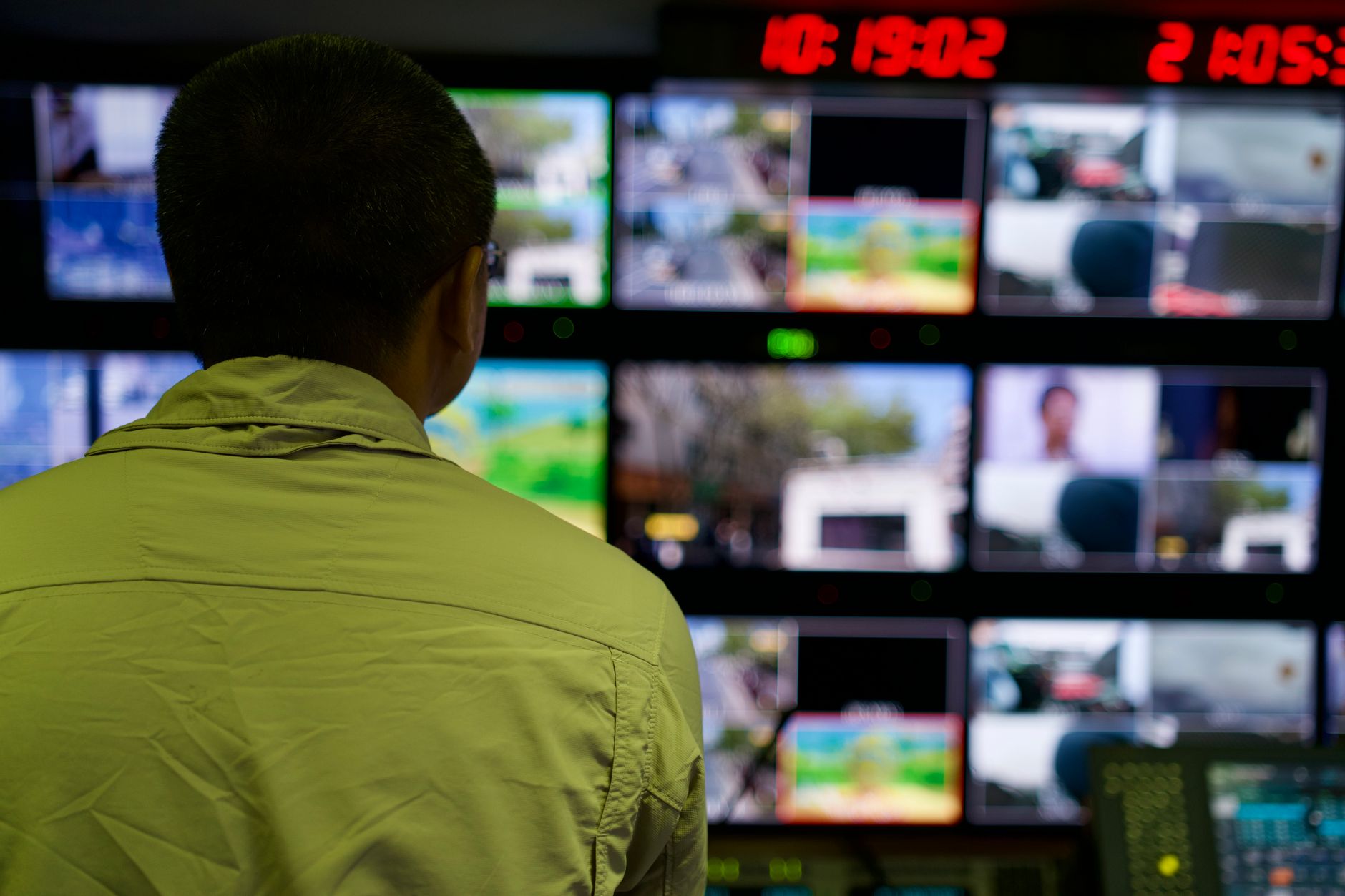 Digital surveillance screens representing foreign disinformation monitoring operations