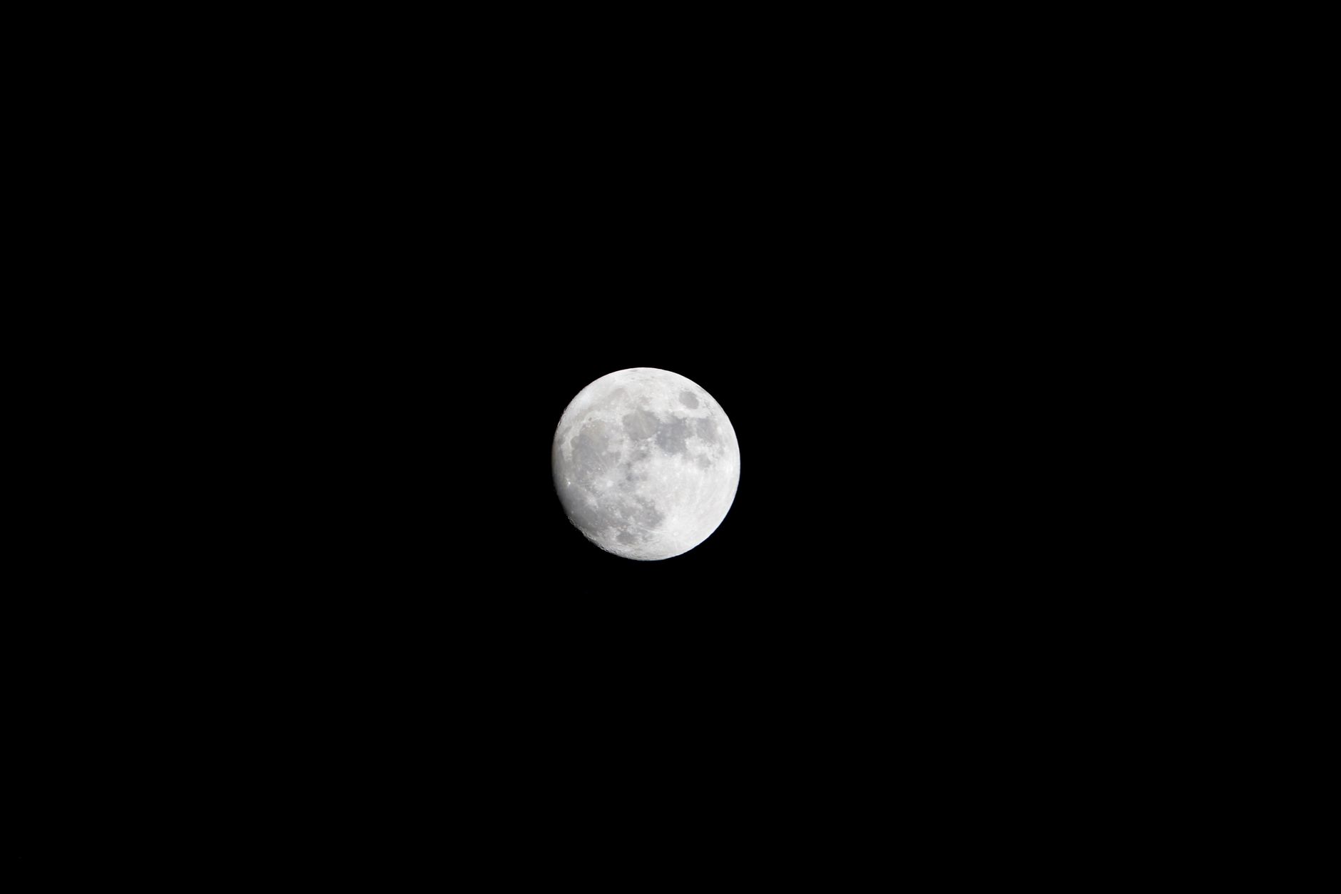 Satellite in orbit above Earth against a dark space background