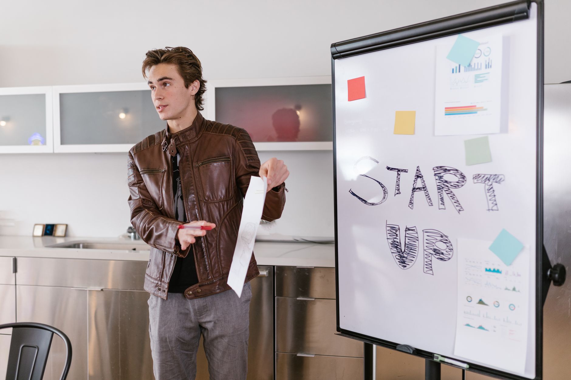 Business professionals reviewing data charts in a modern office setting