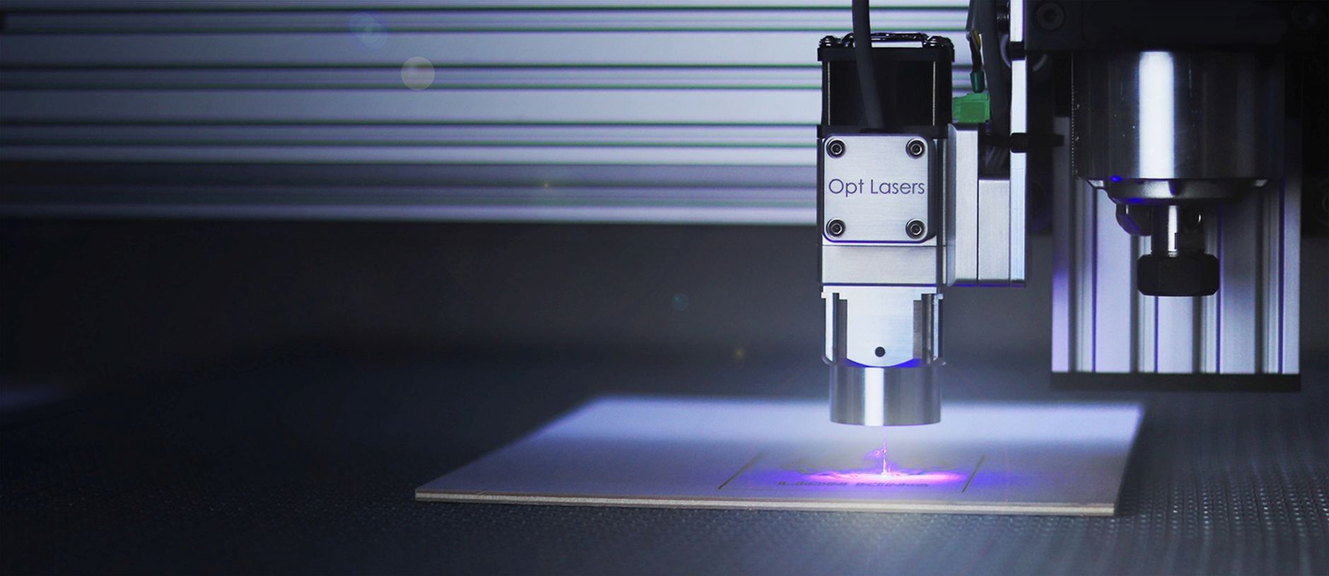High-powered laser beam demonstrating directed energy technology in an industrial setting