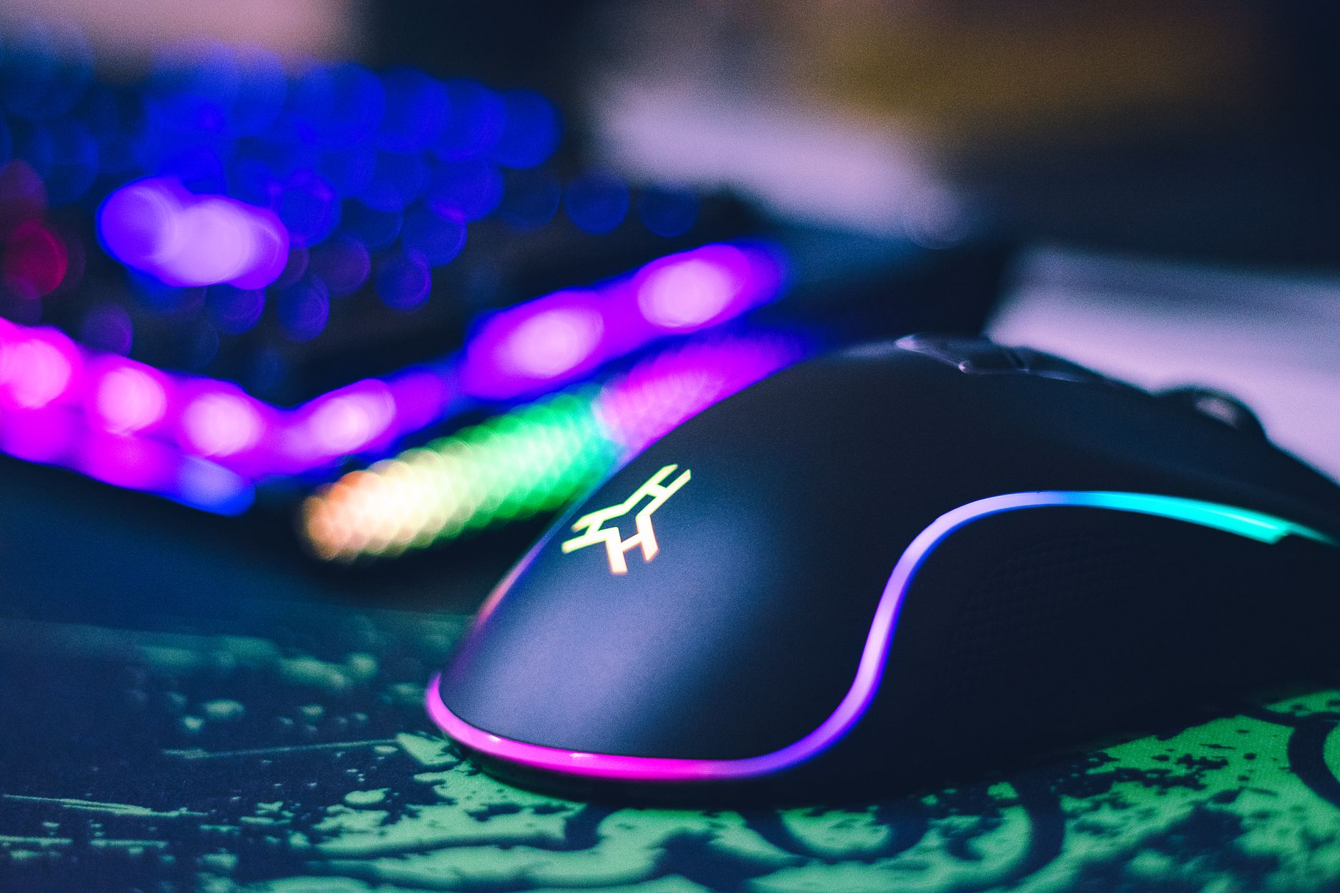 Gaming peripherals including keyboard and mouse on a clean desk