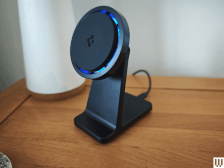 Wired Tested 100+ Wireless Chargers So You Smartphone resting on a wireless charging pad on a nightstand