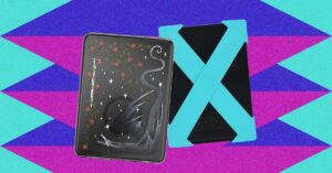 Kindle Accessories Worth Buying in 2026, Ranked by Actual Use Person holding a Kindle e-reader with a protective case on a wooden surface