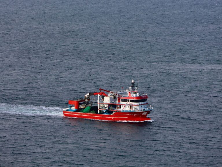 Commercial fishing vessel on open ocean water
