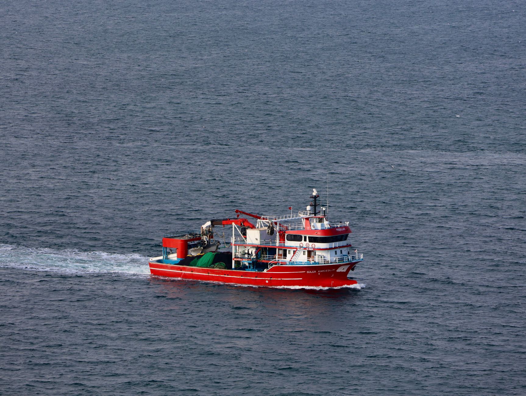 Commercial fishing vessel on open ocean water
