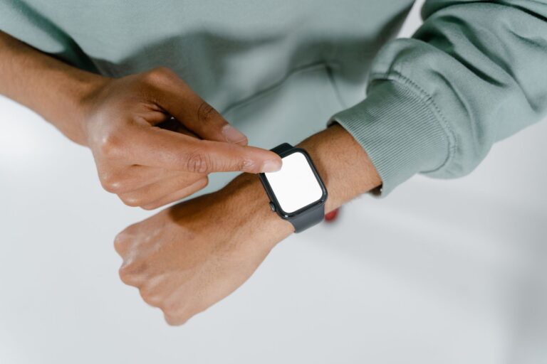 Person wearing a smartwatch during a casual conversation