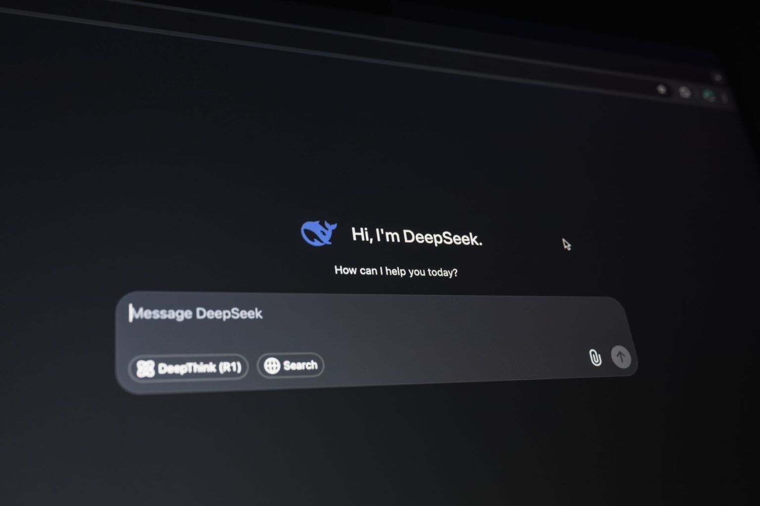 Claude Gets Document Creation and Cowork Tools for Paid Users Person using an AI chat interface on a laptop to create documents