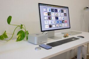A prebuilt desktop PC sitting on a clean desk with a monitor and keyboard