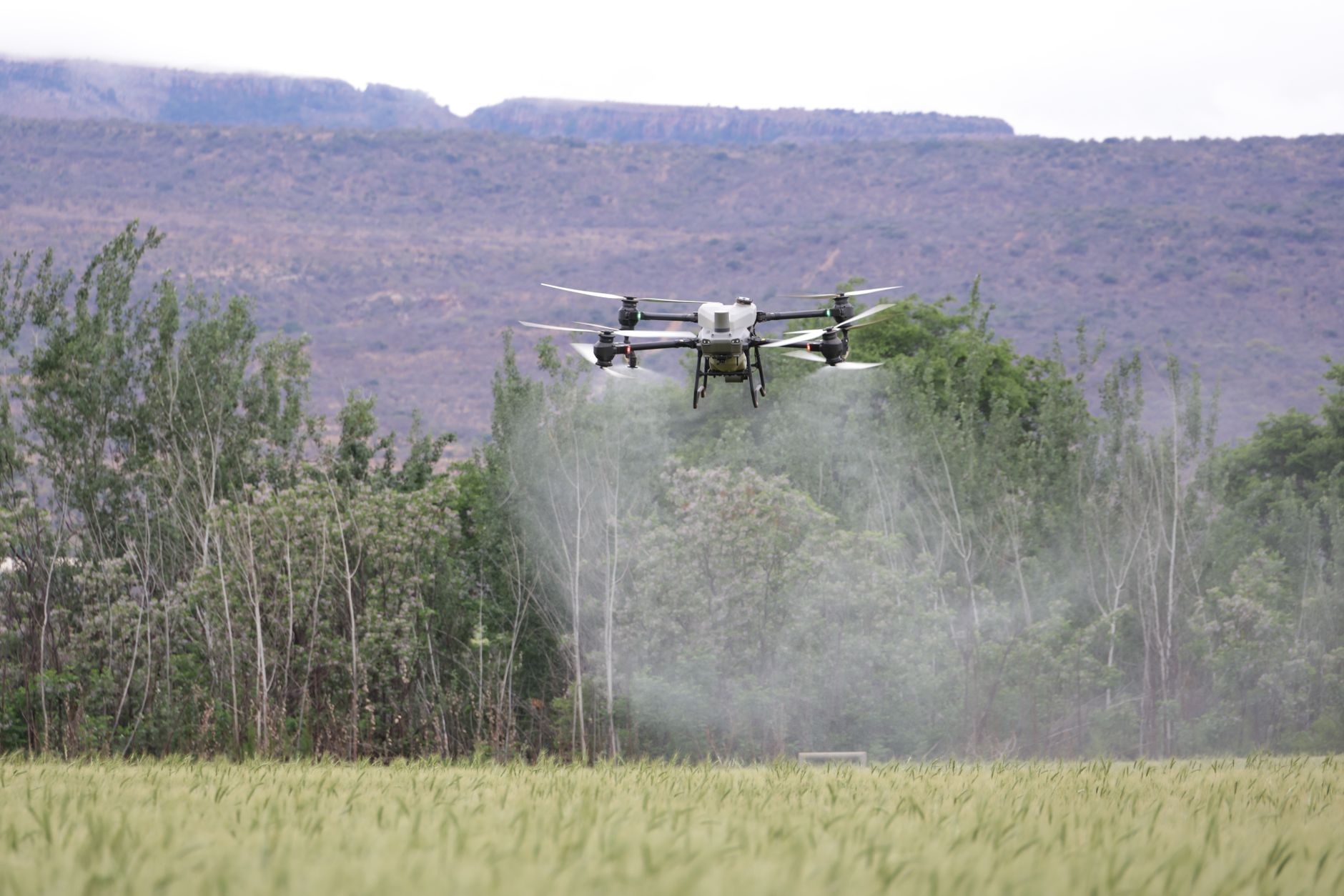Autonomous drone in flight representing Navy interest in unmanned systems