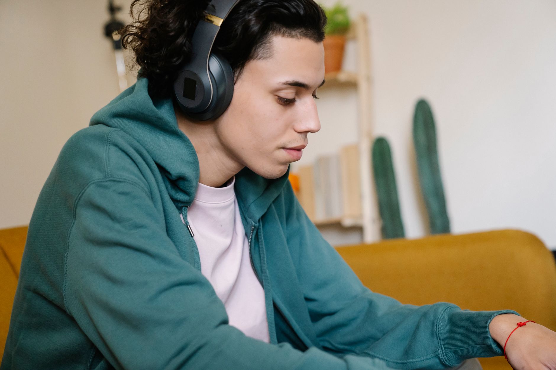 Person wearing wireless headphones during a listening session