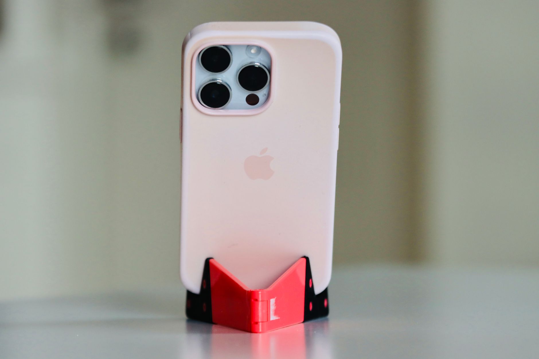Close-up of a foldable phone hinge mechanism showing the fold line