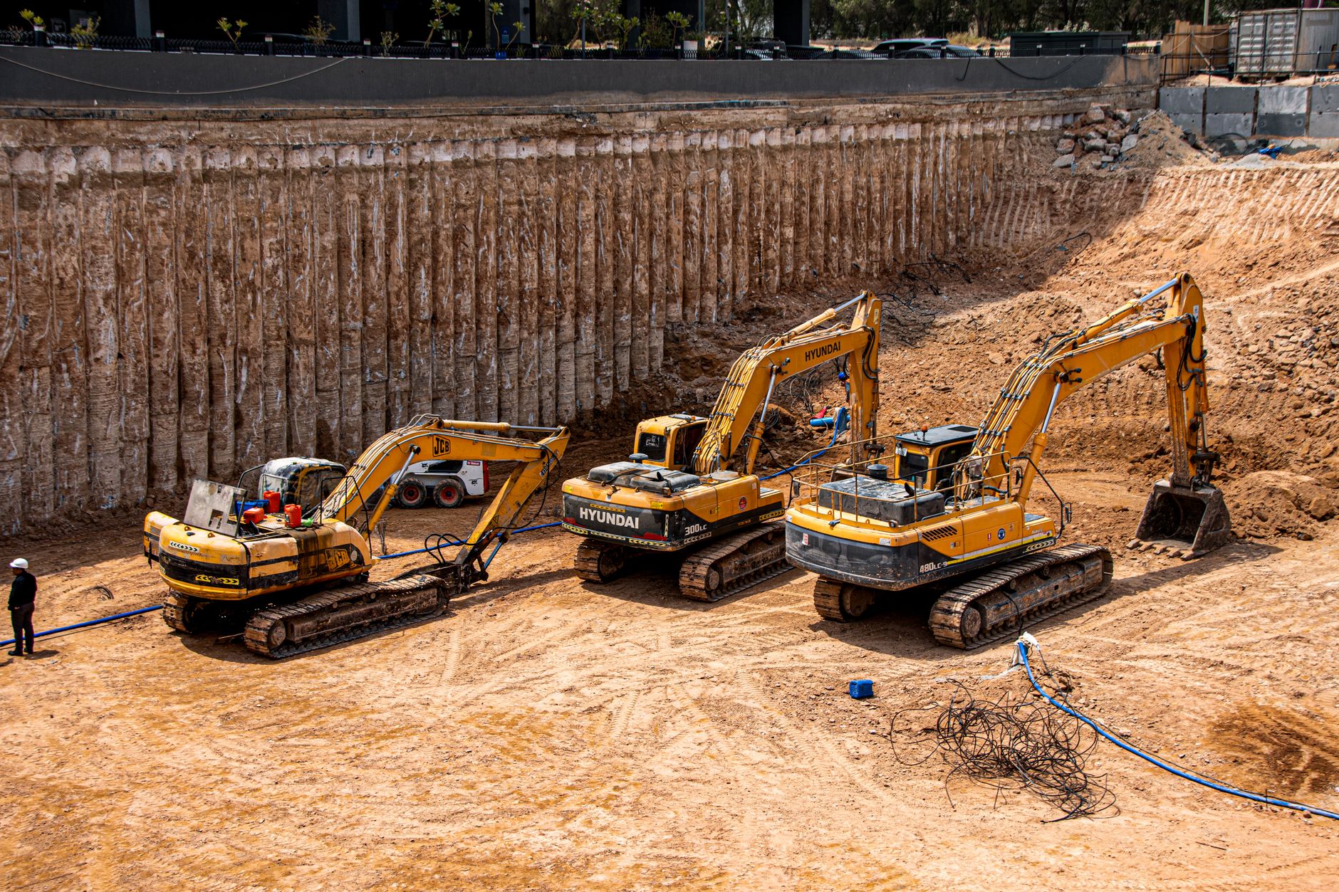 Industrial drilling equipment at an excavation site representing underground hydrogen exploration efforts