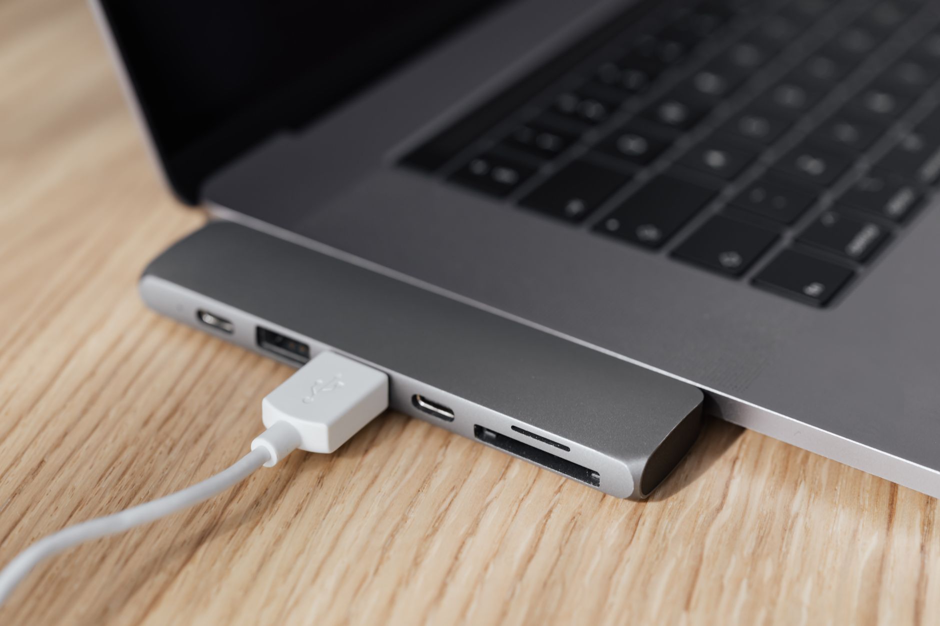 USB-C cable and adapter laid on a flat surface