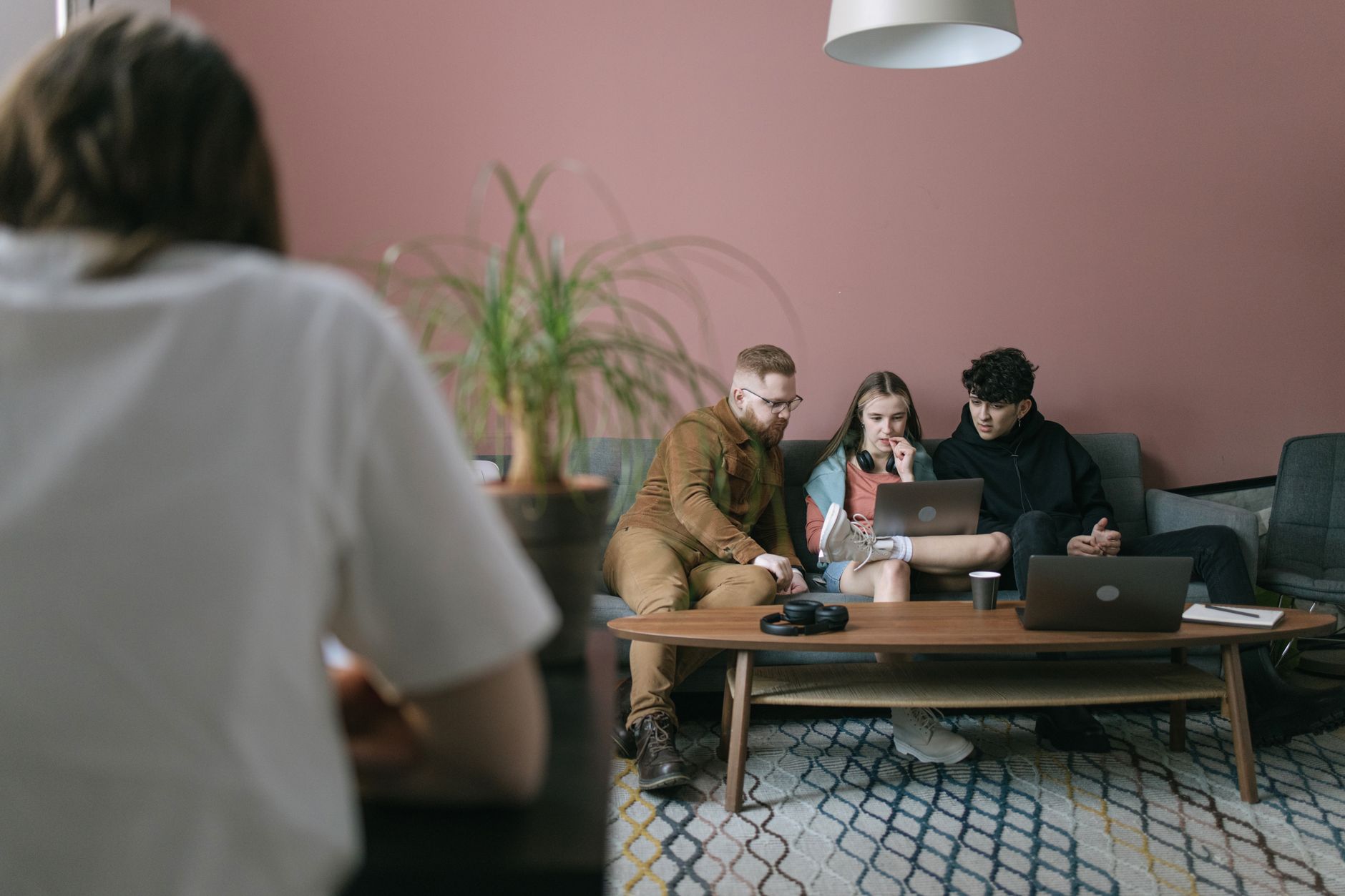 Investors in a meeting room representing defense and VC co-investment discussions