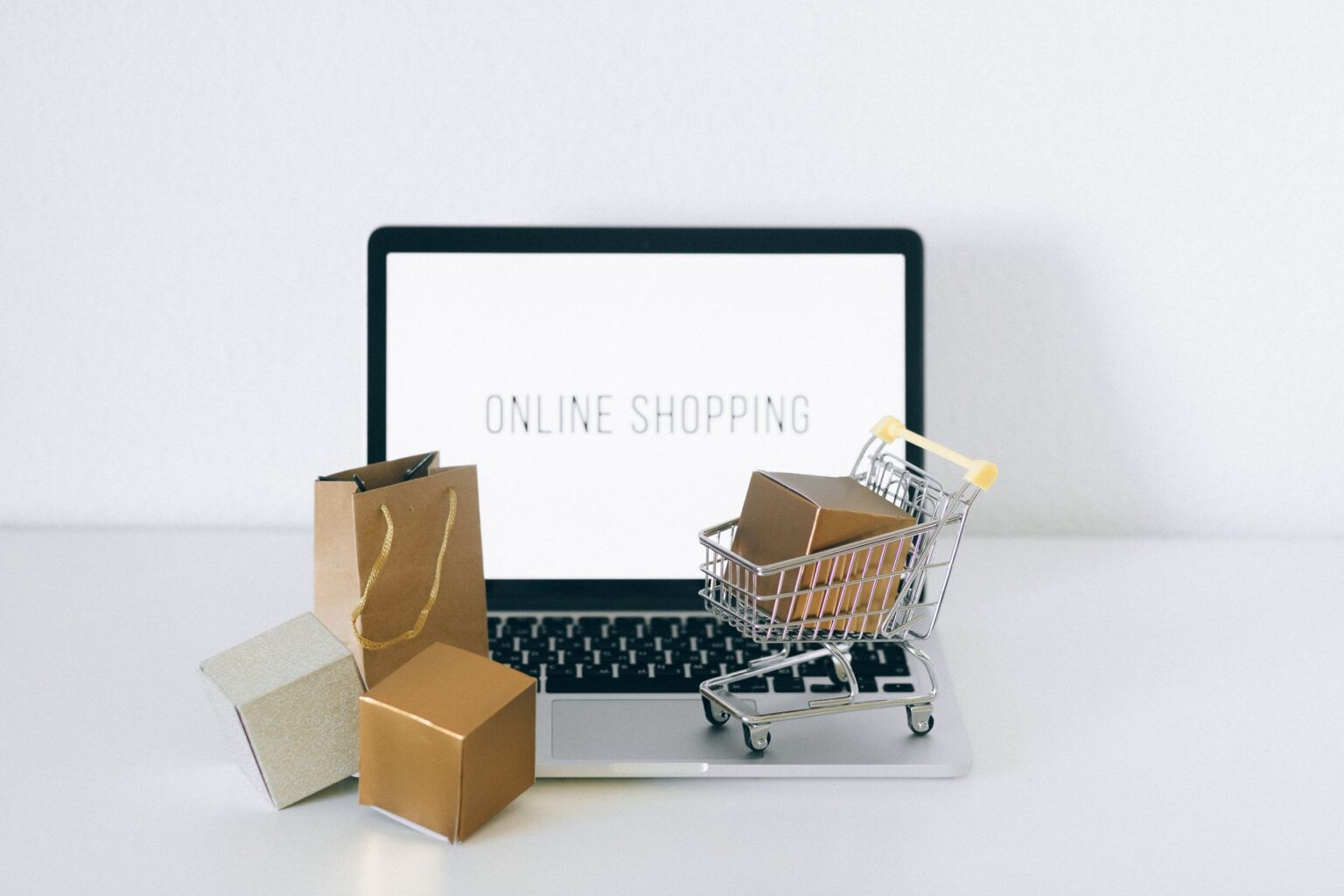 Prime Day 2026 Is Over, But Discounts Are Still Running Person browsing online deals on a laptop with a shopping cart icon visible on screen