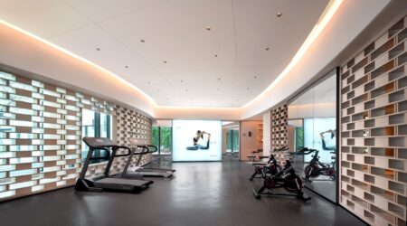 Clean modern gym floor with equipment and open space