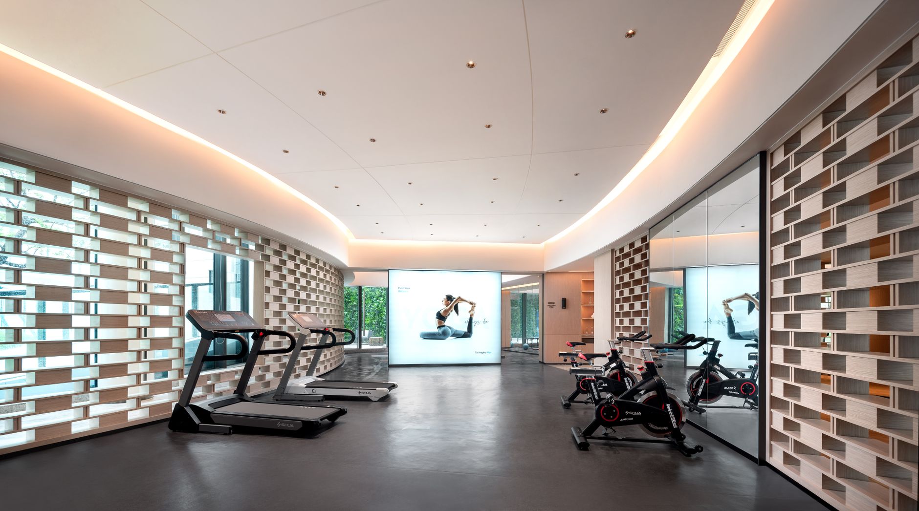 Clean modern gym floor with equipment and open space