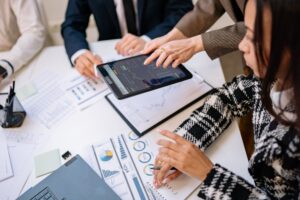 Enterprise AI Hits $2.5 Trillion, But Most Firms Still Employees working across enterprise technology systems in a large modern office