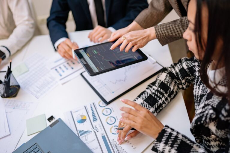Enterprise AI Hits $2.5 Trillion, But Most Firms Still Employees working across enterprise technology systems in a large modern office