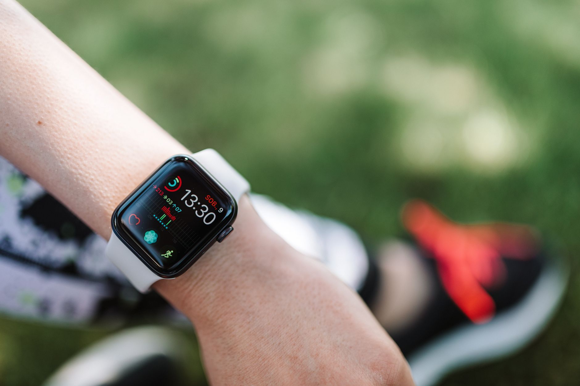Person wearing an Apple Watch with the screen off in a dark environment