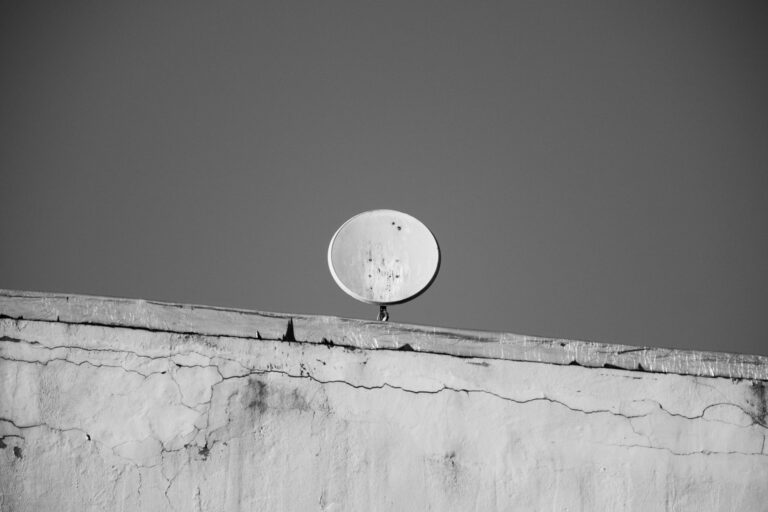 Starlink vs. 5G: Speed Means Nothing Without Coverage A Starlink satellite dish mounted outdoors pointing at a clear sky