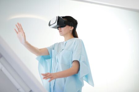 Google’s Genie 4 World Model Adds Audio and More Realistic Worlds A person interacting with an immersive virtual simulation environment