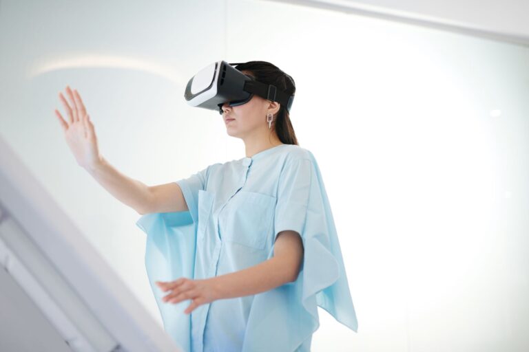 Google’s Genie 4 World Model Adds Audio and More Realistic Worlds A person interacting with an immersive virtual simulation environment