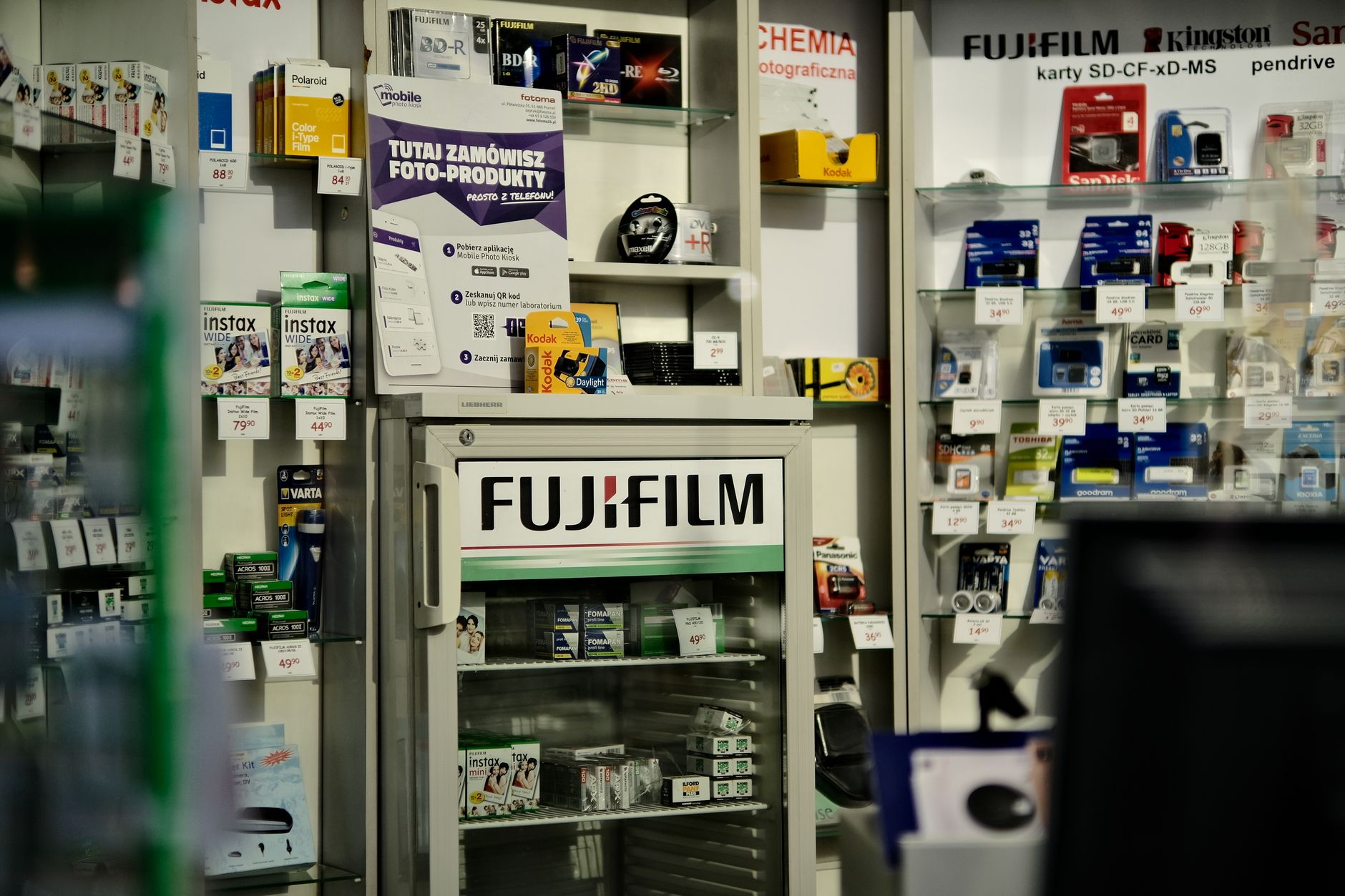 Array of consumer electronics products displayed on a retail shelf