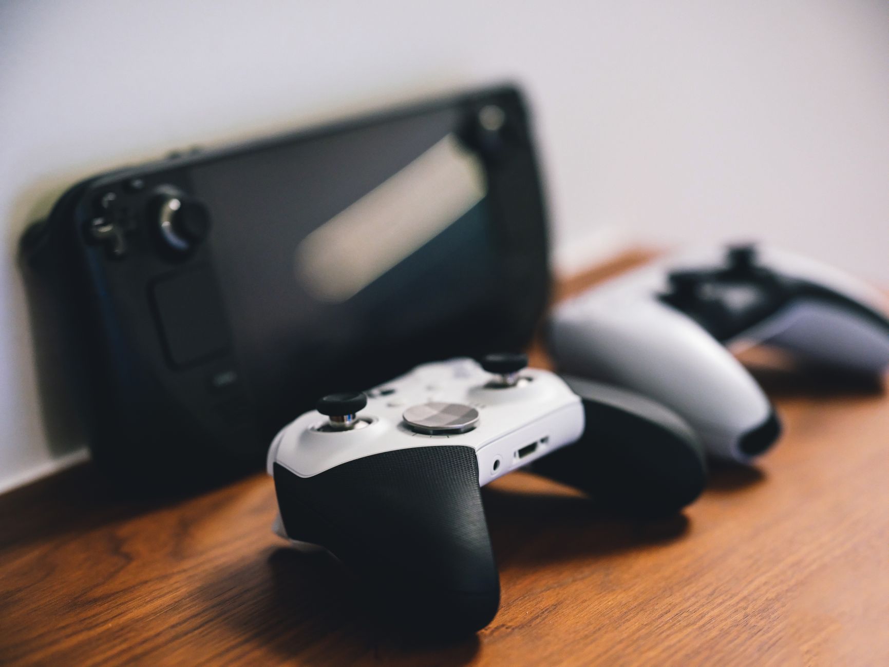 Close-up of a video game controller's buttons and analog sticks