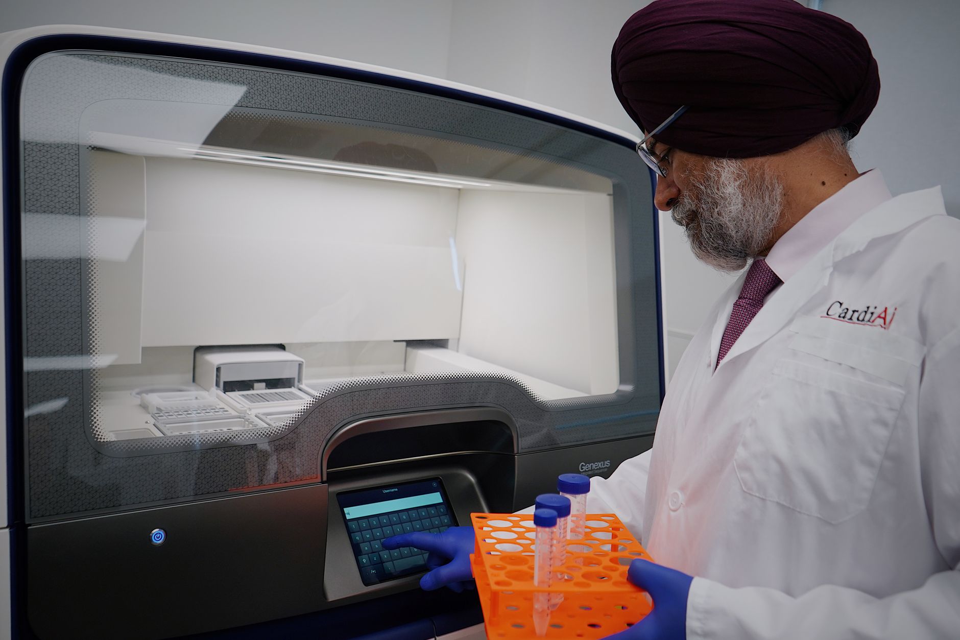 Researchers working at computer screens in a technology research lab