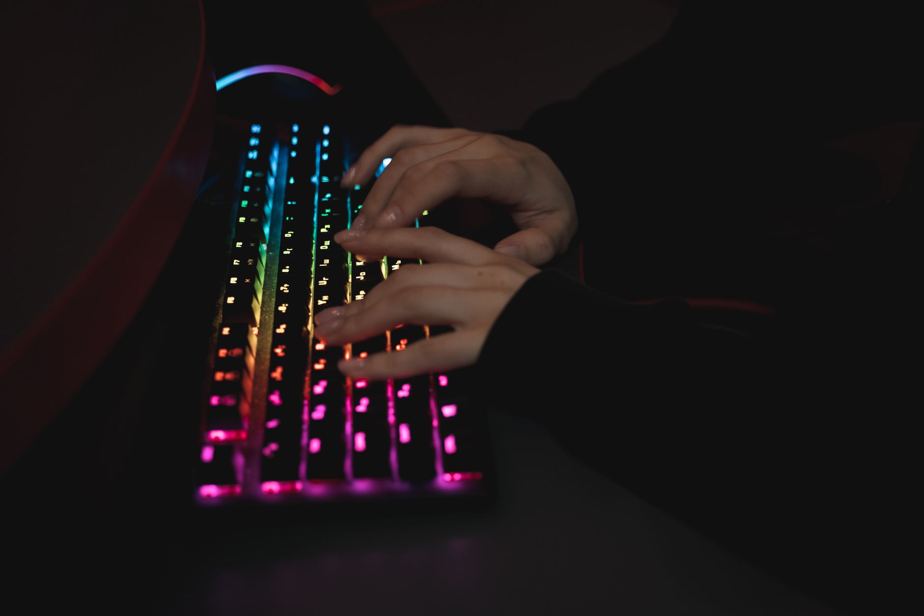 A cat sitting near a computer keyboard symbolizing internet culture