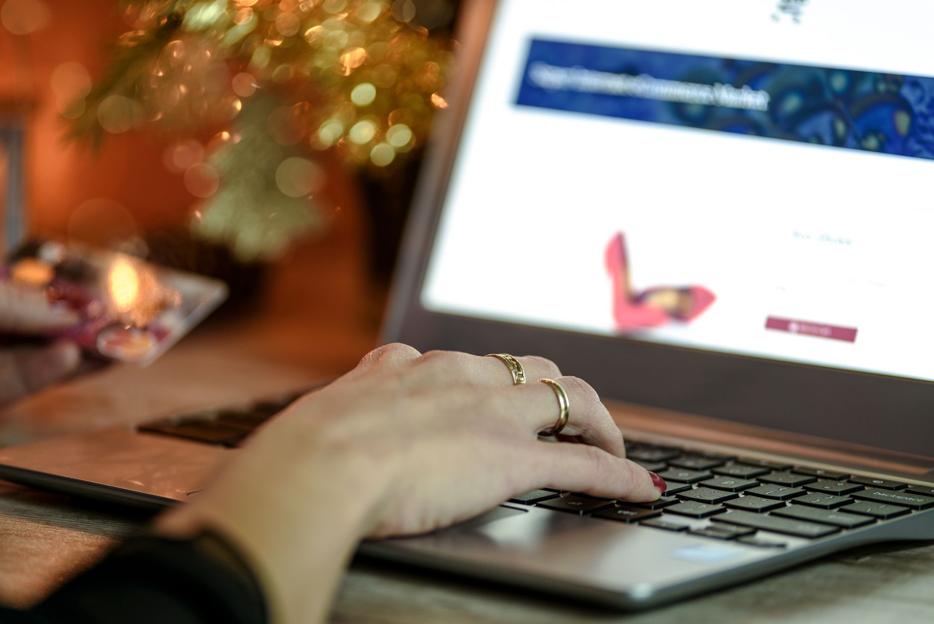 Laptop displaying an online shopping account with a warning notification