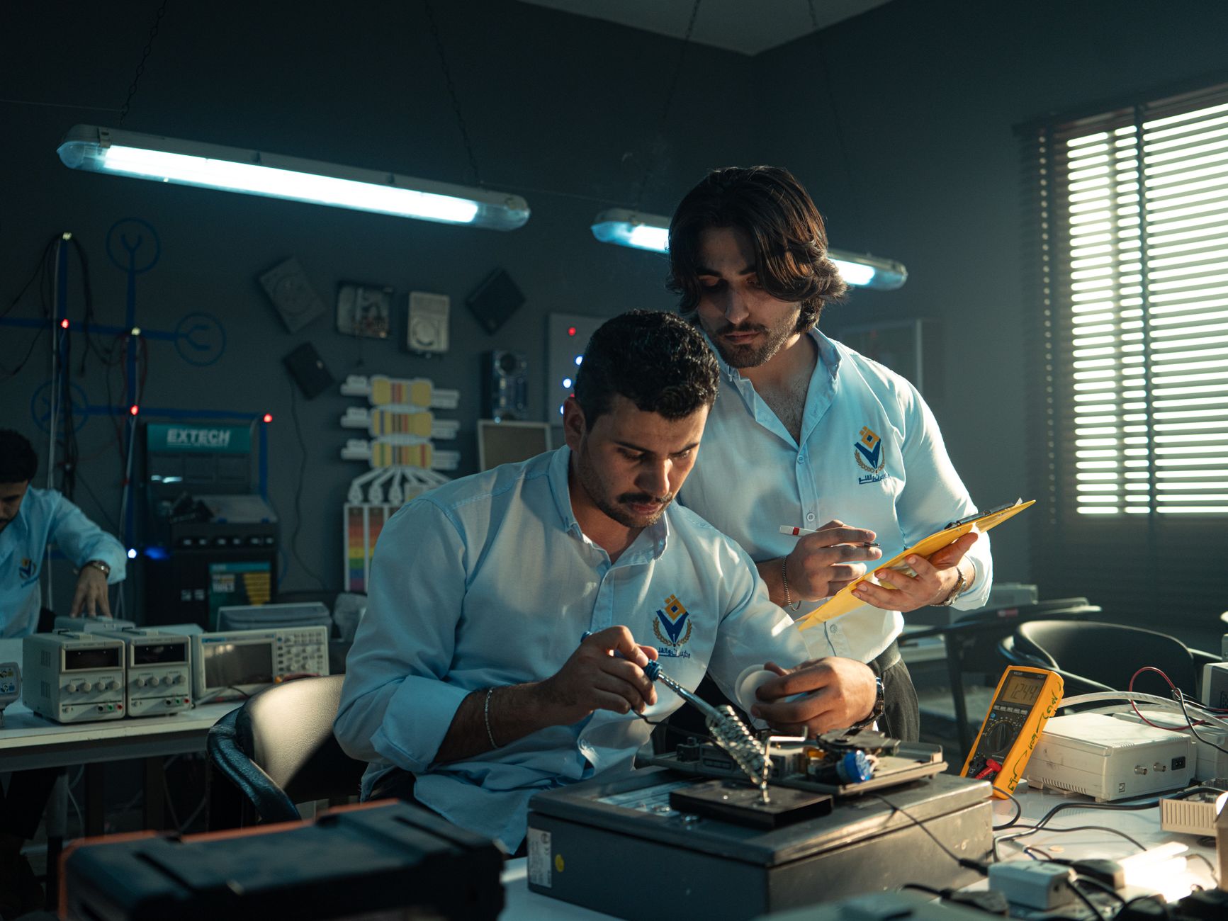 Engineer working on hardware in a technology laboratory
