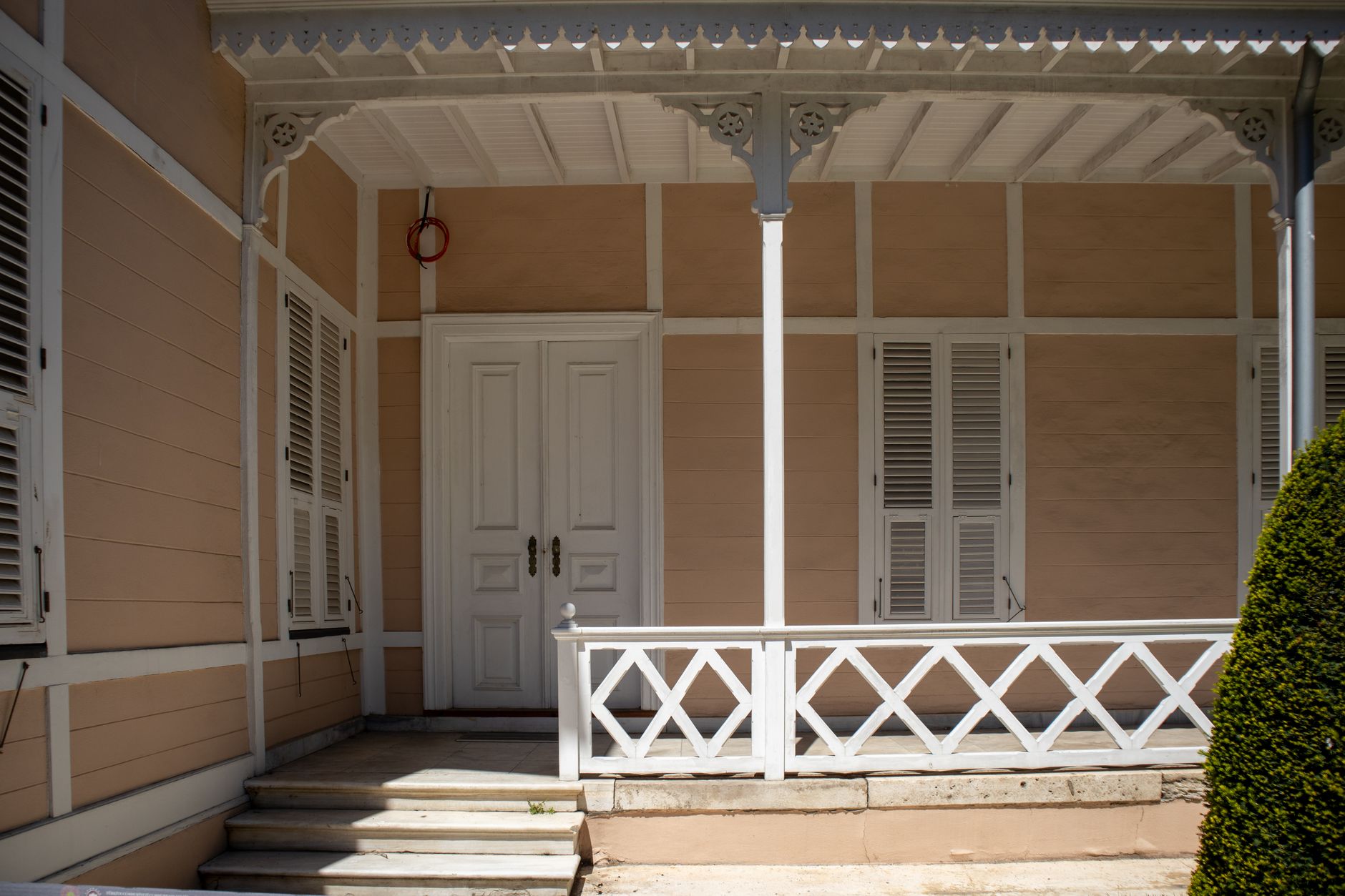 View of a residential front porch and walkway from above