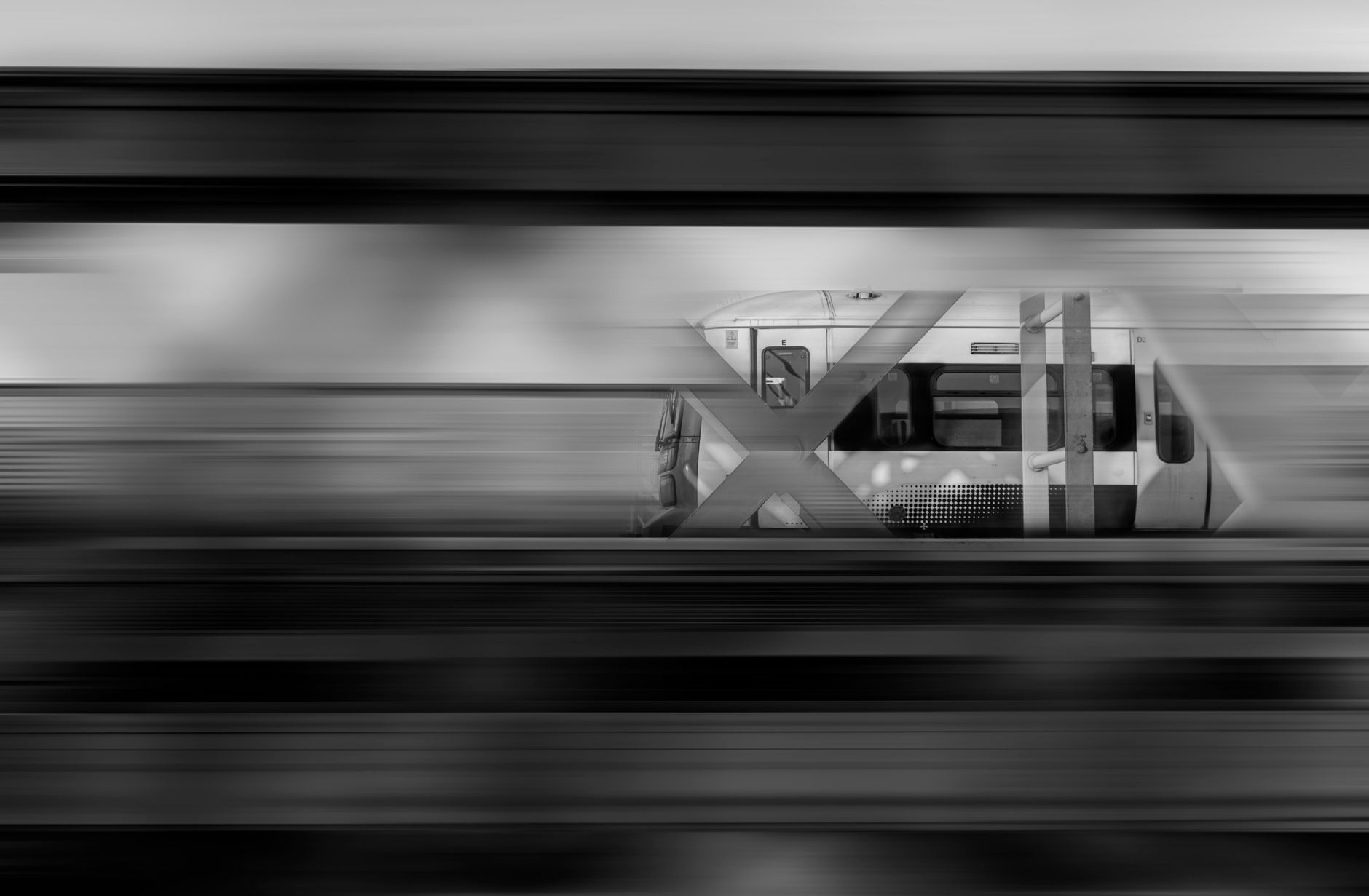 Blurred view from inside a moving vehicle suggesting motion and travel