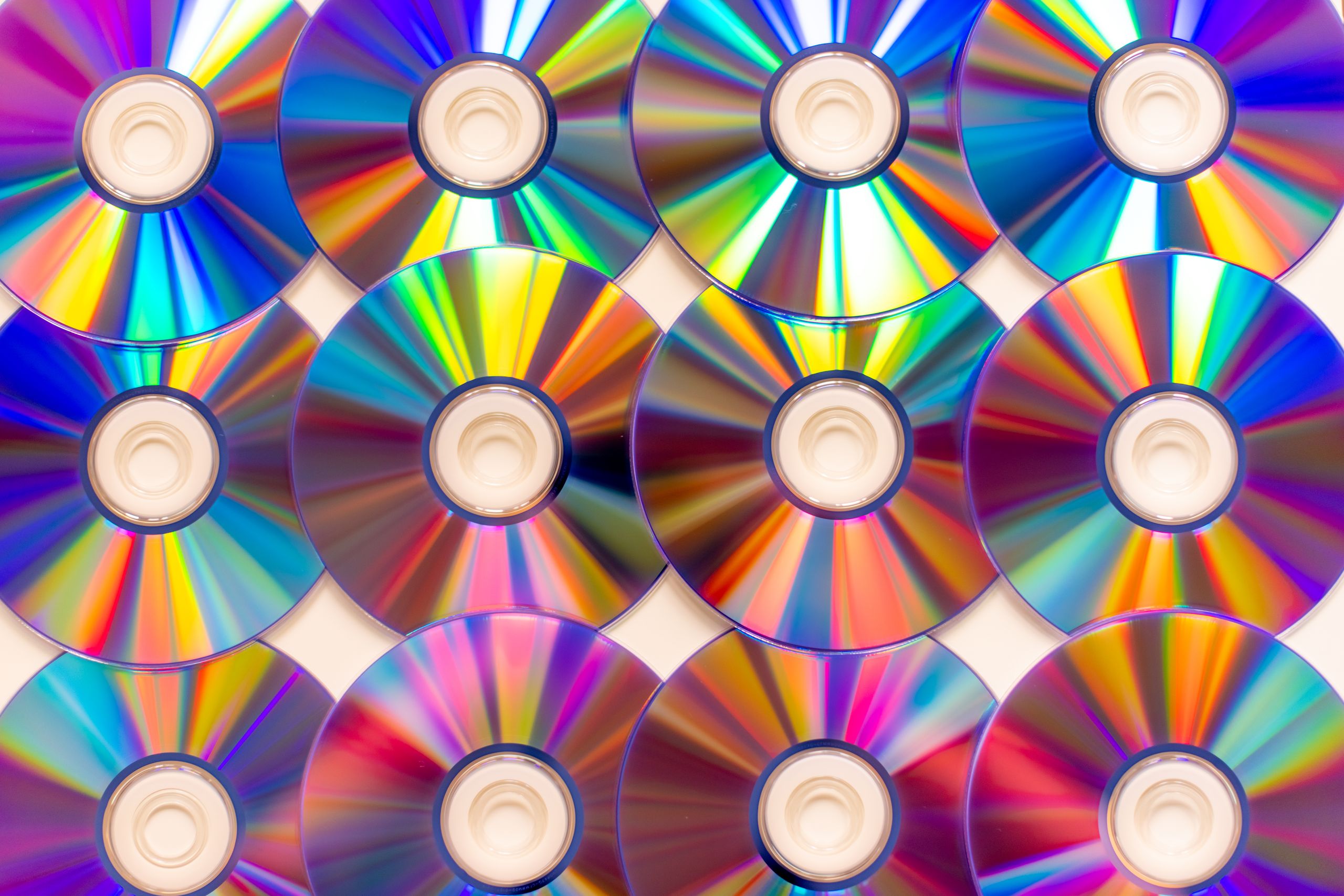 Person browsing CDs in a secondhand record store